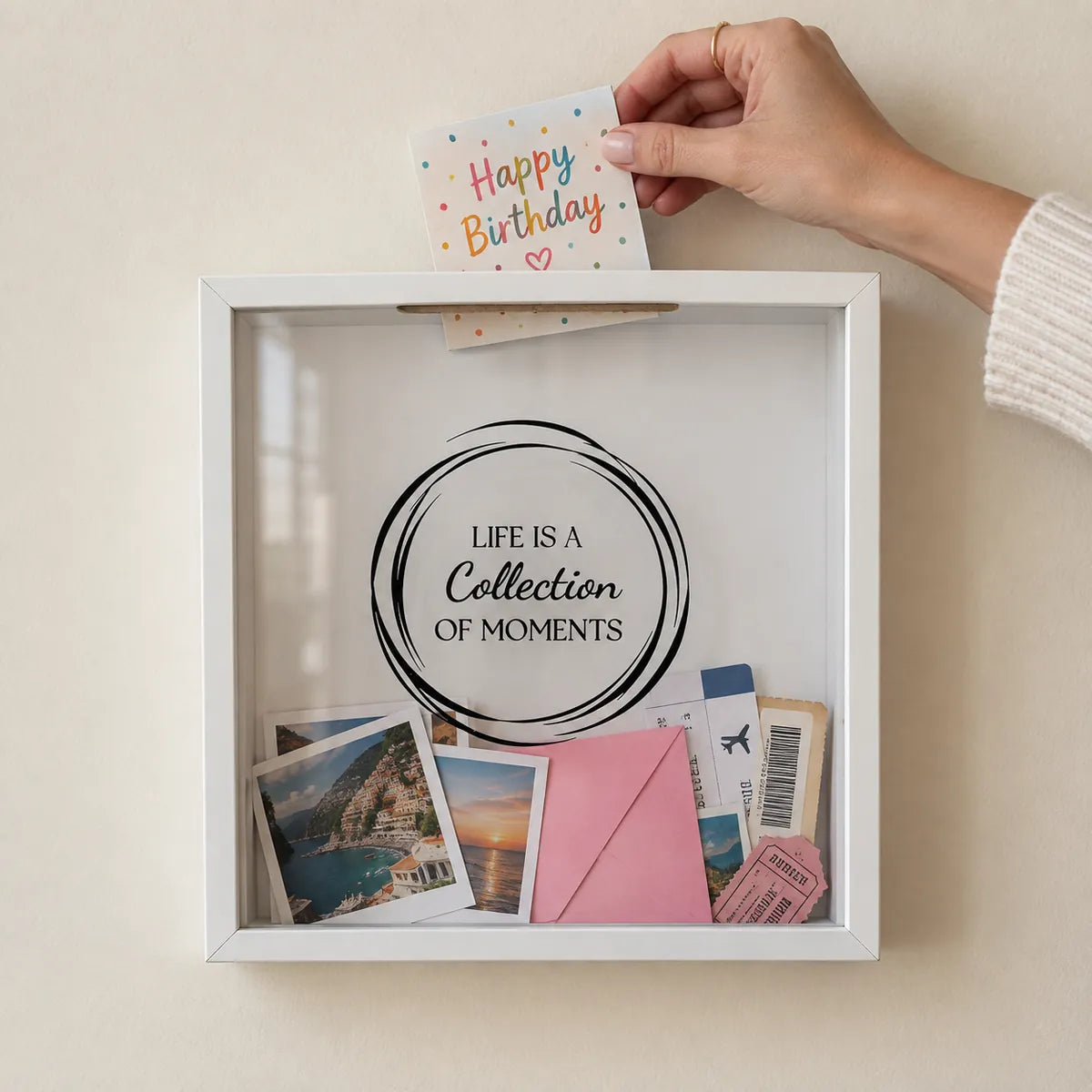 A birthday card going in through the top slot