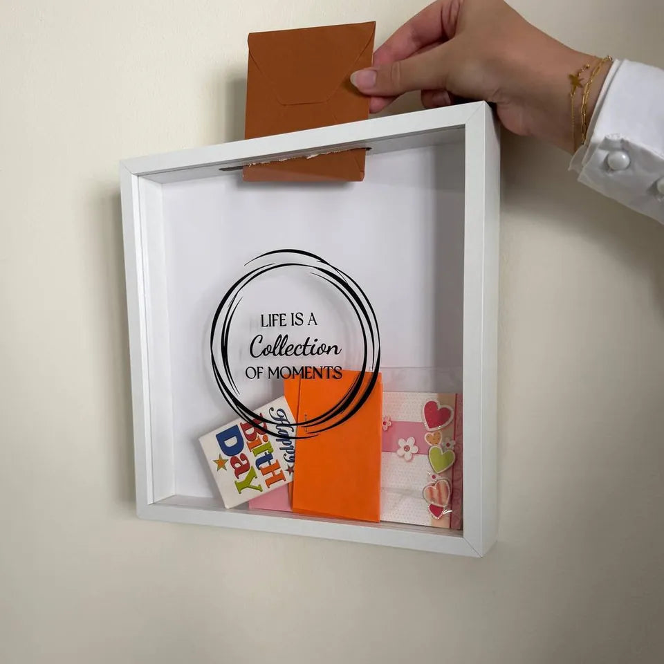 Actual Moments Box with a card dropped through the slot