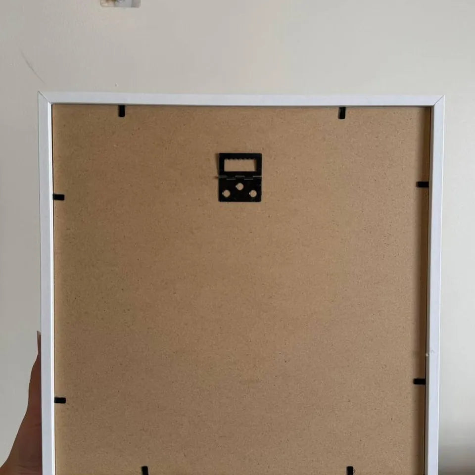 The back of the frame with its wall hook